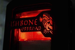 Jeep Wrangler Rubicon Tail Light Cover - Fishbone Offroad - Black textured powder coat - `18-`27